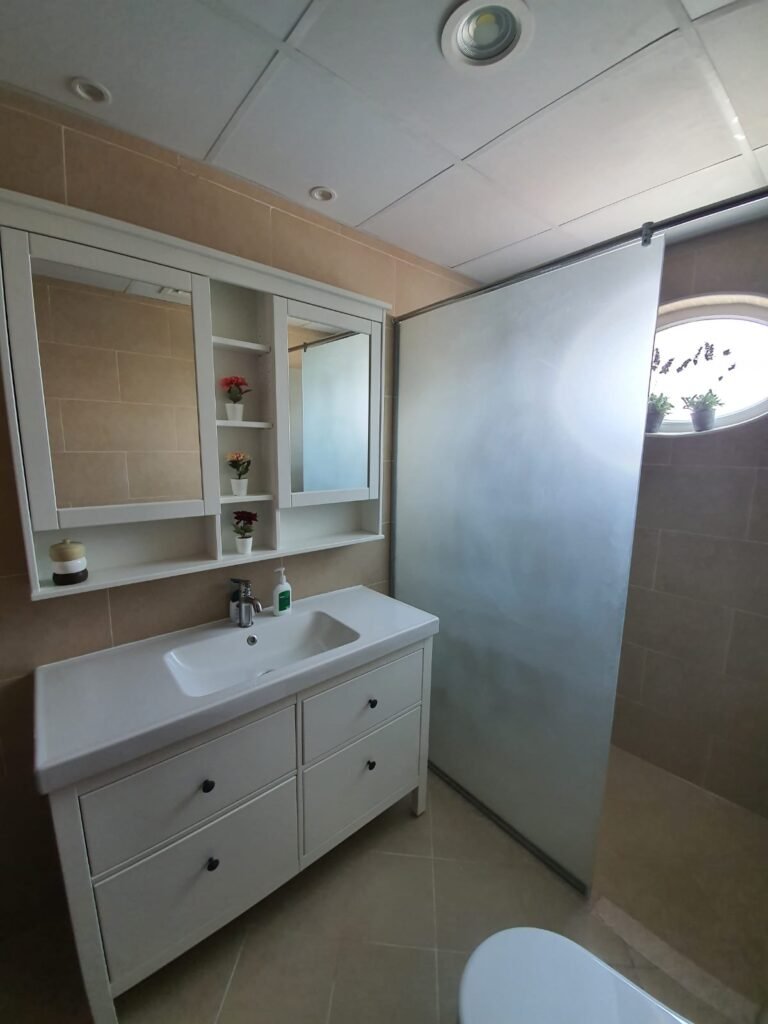 Bathroom renovation project in Dubai by TRIPLE MAE